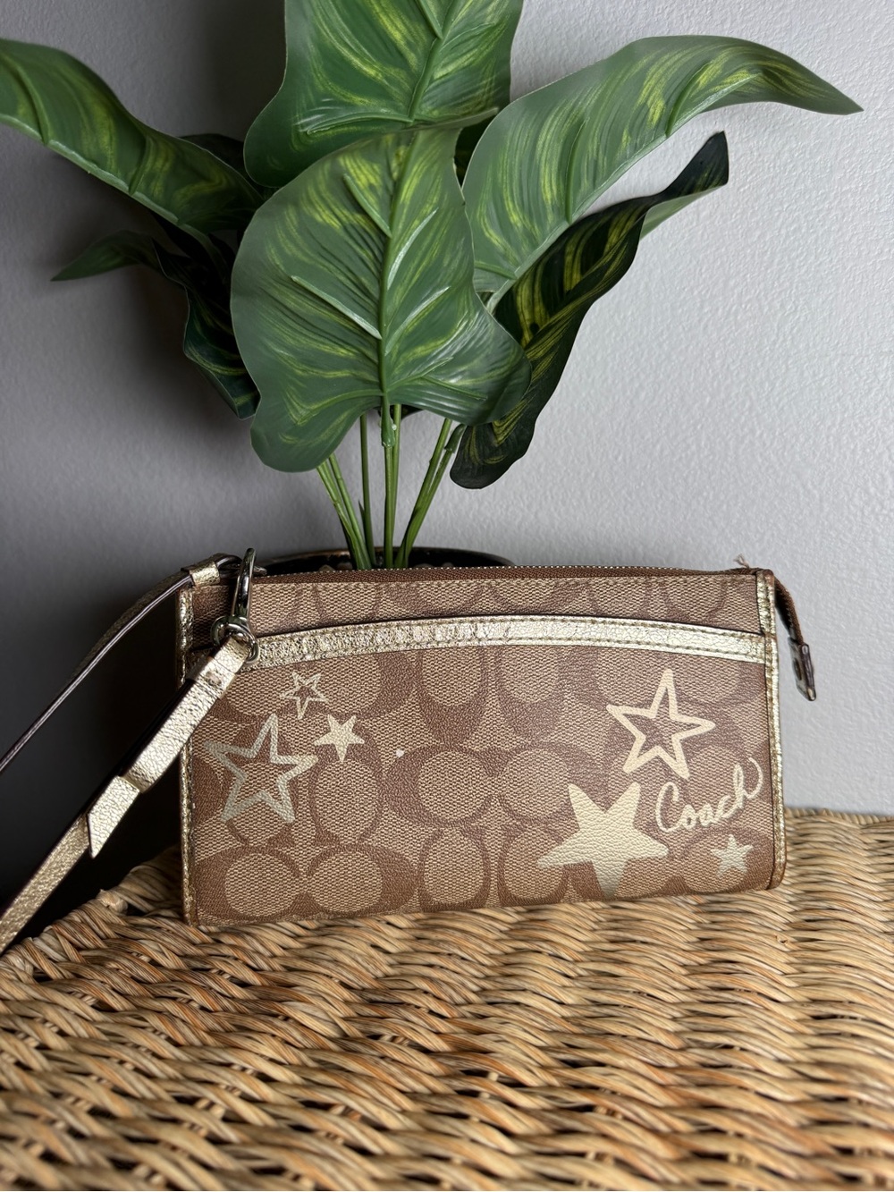 Coach Metallic Star-Accent Signature Wristlet in Brown and Gold